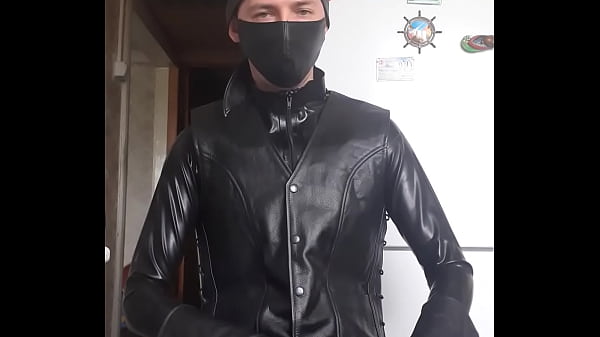 Bloke In Leather Jacket Putting Gloves