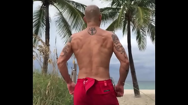Flexing At Beach
