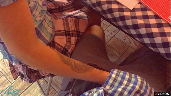 HAND WORK CLASSMATE UNDER THE TABLE ON LESSON