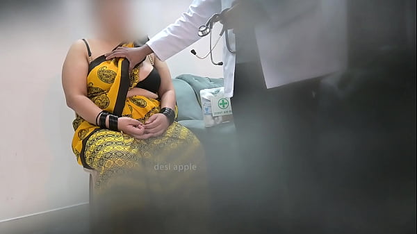 Doctor Handling Patient In Clinic