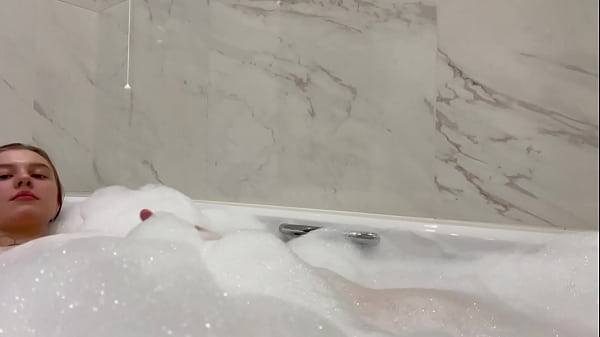 Spraying And Masturbating In A Bathroom With Lots Of Bubble Bath