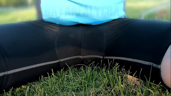 Pee In Lyrca Cycling Shorts On Grass