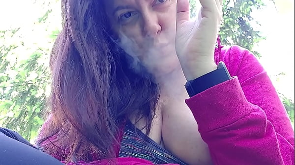 Nicoletta Smokes In A Public Garden And Reveals You Her Huge Boobs By Pulling Them Out Of Her Shirt