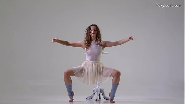 Ursula Fe Dark-haired Curly Hair Gymnast