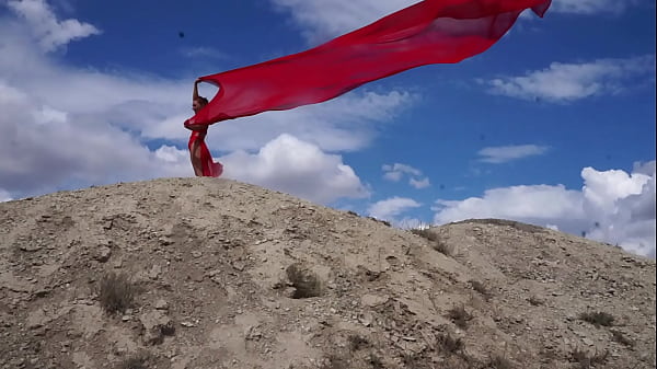 On Top Of Hill With Red Flag