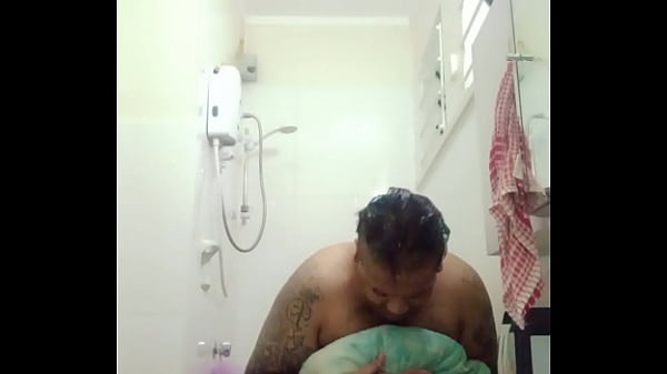 Vaibhav Is Stuffing His Towel & Bathrobe Against The Bathroom Vanity