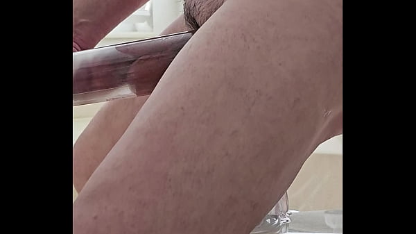 Thrusting My Member And Nutsack While Sinking On A Seven Head Clear Dildo