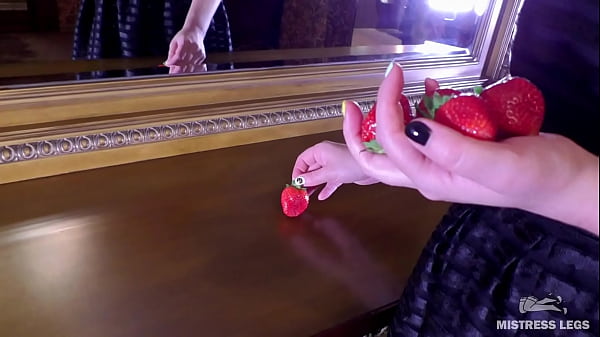 Plump Strawberry Grabbed Closeup By Lovely Bare Feet On The Dresser