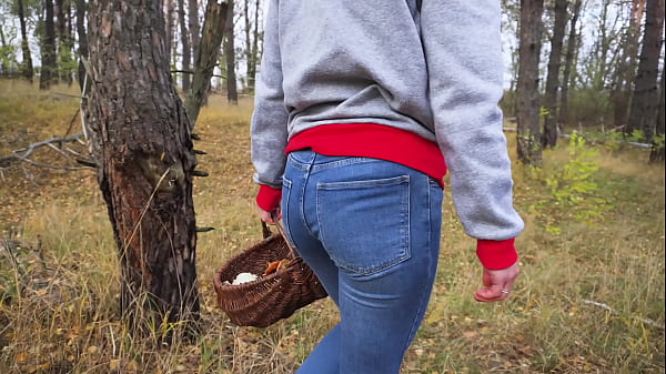 Hottie In Blue Jeans Picks Outdoor And Bends Over Displaying Her Massive Butt