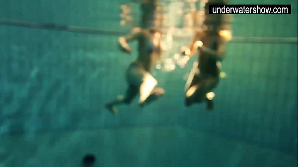 Two Alluring Amateurs Presenting Their Bodies Off Under Water