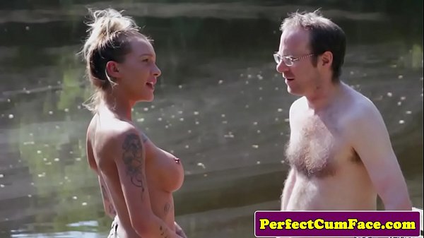 Busty Femdom Tugging Dude Outdoors For Load