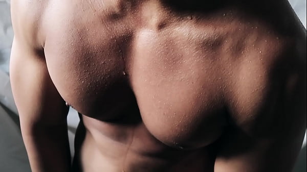 Close Up Into The Sweat Over Flexing Bod