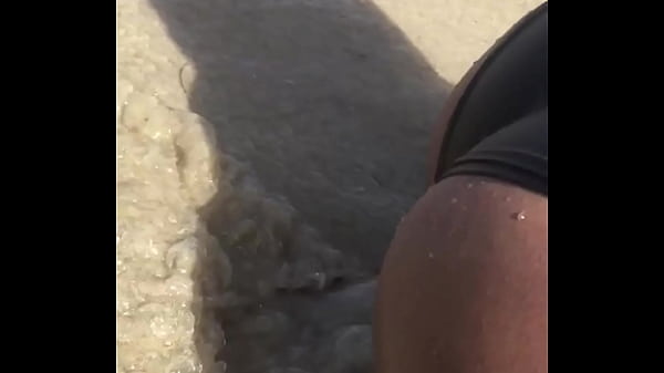 UN Cuerpo Scorching En La Playa