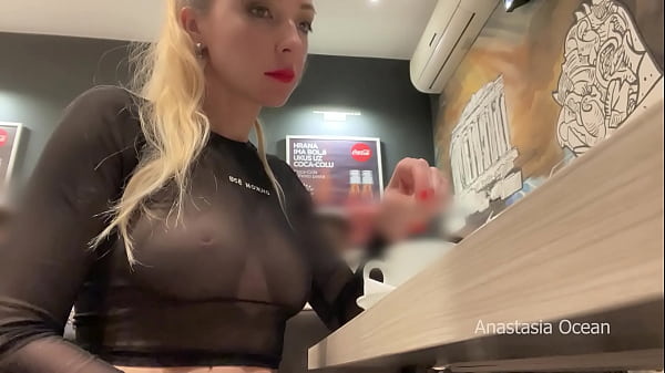 Flaunting Her Massive Melons In Transparent Top In Public Cafe.