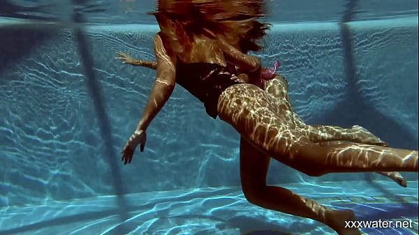 In The Indoor Pool, Two Jaw-dropping Gals Swim