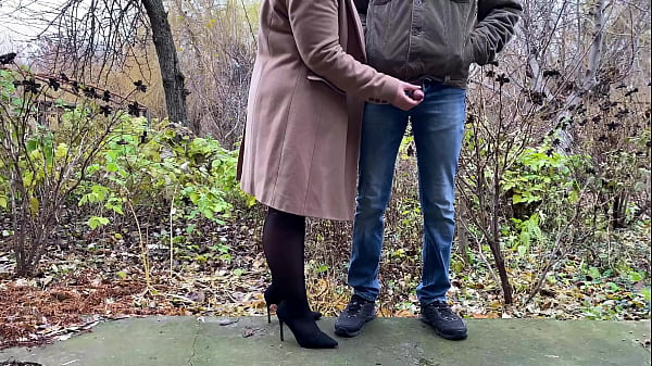 StepMother-in-law In Leather Skirt And Heels Grasps Son-in-law's Shaft While He Pees