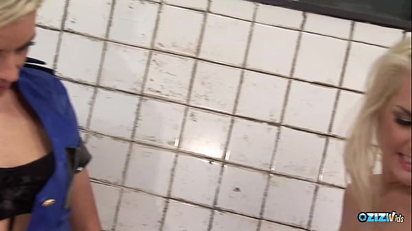 Ravishing Blonde Cop Masturbating With A Chick In The Jail