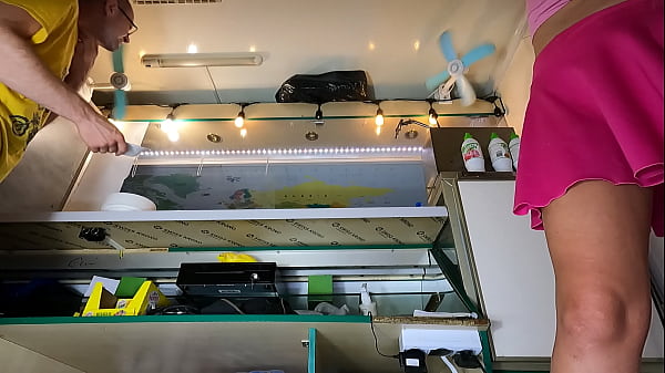 This Sexy Vixen Looks Great Bending Over To The Bottom Shelf