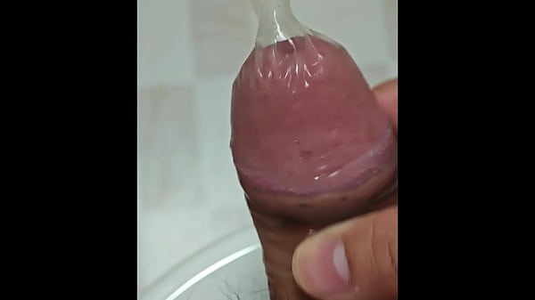 Cum Again Inside Condom Stuffed With Semen