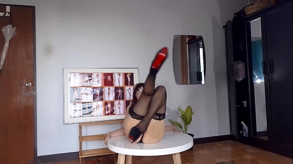 Regina Noir Trying On High Heels. Striptease In Black Lingerie And Stockings 4