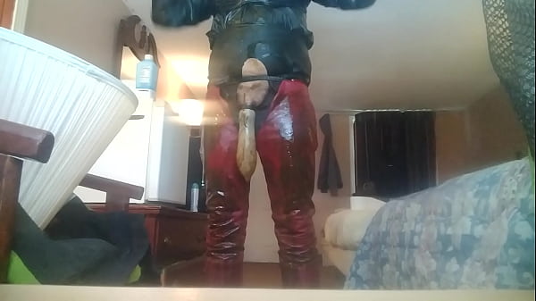 Leather Farmer Wearing A Condom Loaded With Piss And Load