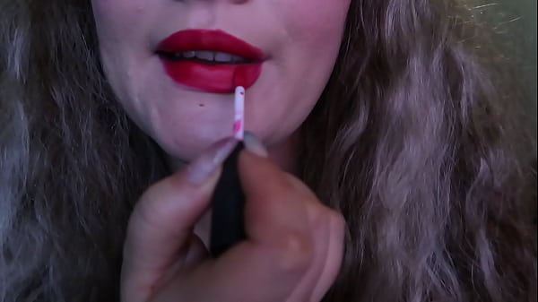 LOVELY CHICK PAINTS HER POUTERS RED AND SMOKES A CIGARETTE, I HOPE YOU LIKE IT