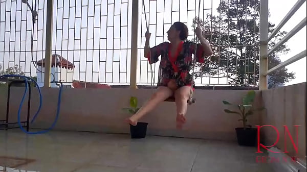 Depraved Housewife Swinging Without Panties, Hiding From The Rain Under An Umbrella. FULL VIDEO