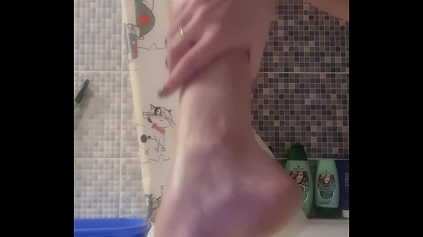 Burning Bitch Daubs Cream On Her Legs In The Bathroom