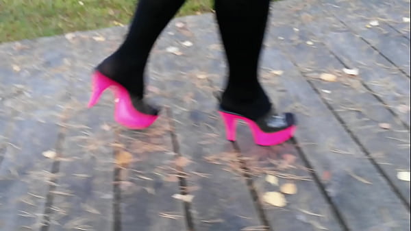 Woman L Walking Wirh Pink Mules.