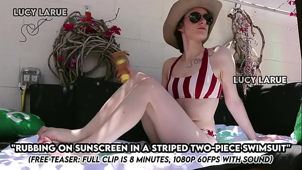 Fondling On Sunscreen In A Shedded Two Piece Swimsuit