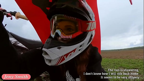 Bare Dame Saddling A Dirt Bike
