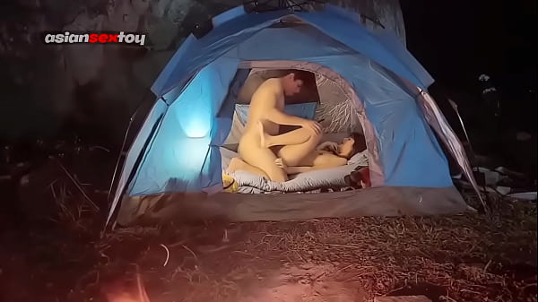 Asian Coeds Have Romantic Sex In A Tent While Others Are Sleeping