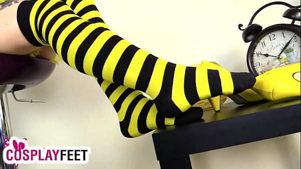 Sultry Footfetish Bee Takes Off Heels And Striped Stockings