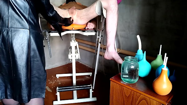 Dominatrix Washes Patient Backside With Two Different Enemas