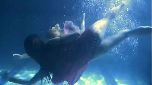 Two Sultry Lesbians Underwater Touching Each-other. Y. S Are Unclothed In The Pool. Youthful Nudists ..