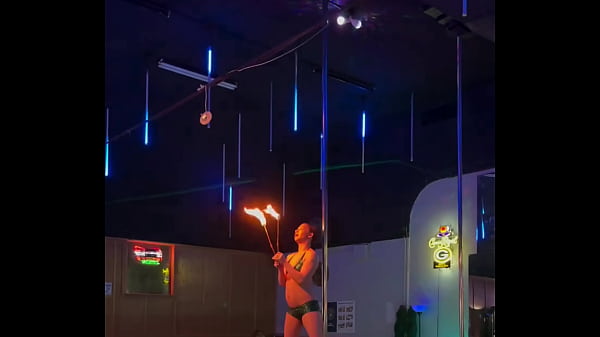 Destiny Mae Dancing And Playing With Fire On Stage At The Bare Club