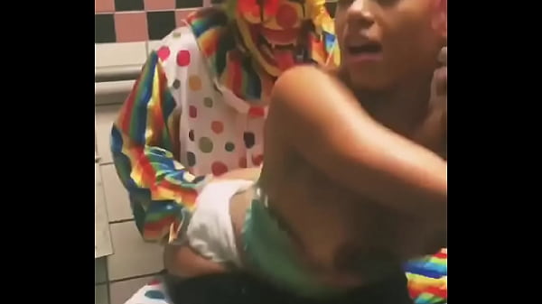Gal Works Clown In Bathroom Stall