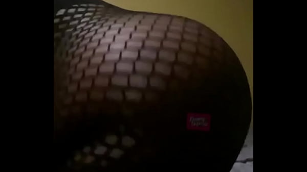 Jiggling Rump In Fishnet Physique Suit