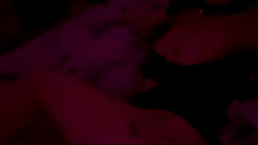 Authentic Couple Intimate Moment Under Red Lights