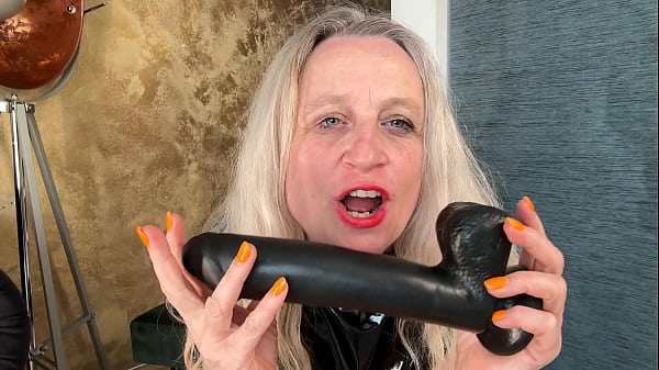 In A Latex Corset Lustful Prolapse Full-hand Play With A Mega Dildo
