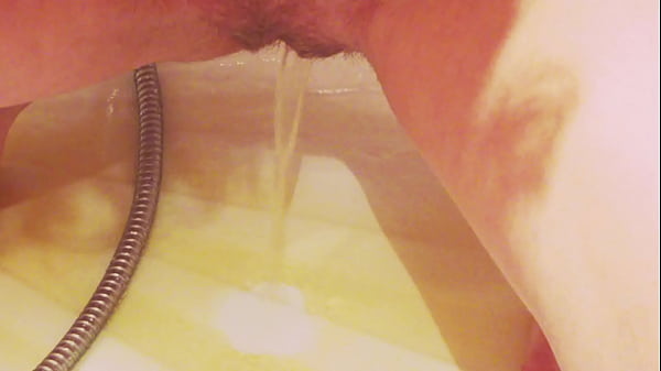 Bushy Snatch Pissing In The Shower. A Skinny Girl With An Exquisite Butt Washes, Urinates And Pours Milk On Her Bod. Home Obsession And Close-ups.