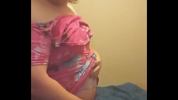 Toby The Crossdresser In A Dress Blowing A Dildo