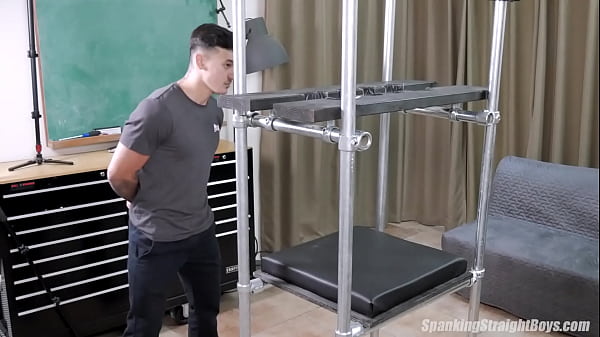 Nubile Masculine Beefcake Spanked In A Bondage Contraption